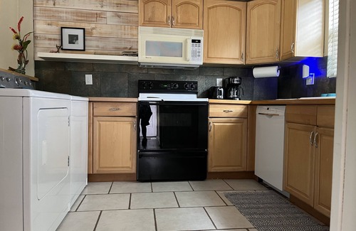 St. Nicholas House | Riverfront Retreat: Steps from Downtown with Pool and Spa