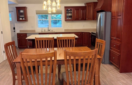 Grant House | Riverfront Serenity, Rustic Charm and World Class Fishing on the Muskegon River.