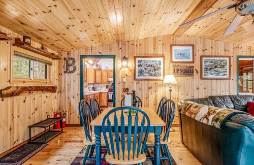 Lac du Flambeau Cabin | Riverfront Retreat with Dock, Kitchen & Firepit - Rated 10/10
