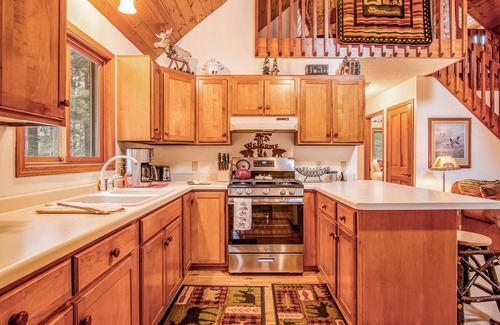 Lac du Flambeau Cabin | Riverfront Retreat with Dock, Kitchen & Firepit - Rated 10/10