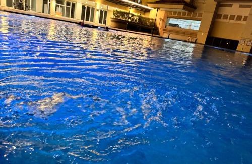 Kuching Apartment | Riverside High Floor Stay: Waterfront Views & Pool Access