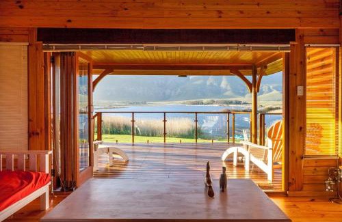 Overstrand House | Eco-Friendly Rivers End Farm with Ocean Views & Hot Tub