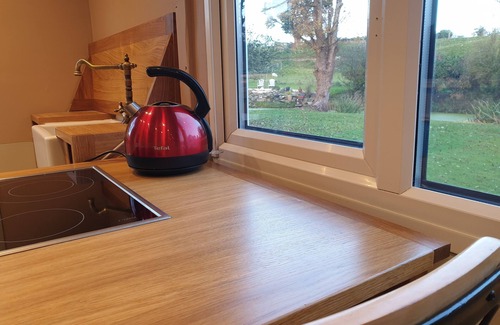 Oswestry Cabin | Riverside Cabin in Shropshire with Spa & Hot Tub