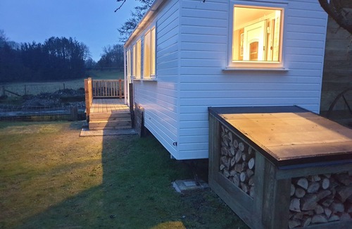 Oswestry Cabin | Riverside Cabin in Shropshire with Spa & Hot Tub