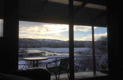 Lampeter Ski Chalet | Pet-Friendly Riverside Chalet in Lampeter, West Wales