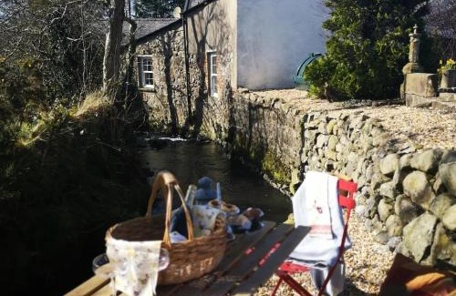 Ballyclare House | Riverside Cottage at Logwood Mill: Pet-Friendly Oceanfront Retreat