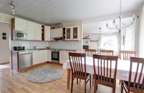 Rovaniemi Villa | Riverside Country House: Oceanfront Escape for Families