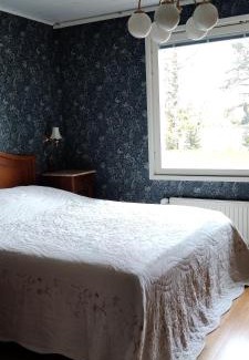 Rovaniemi Villa | Riverside Country House: Oceanfront Escape for Families