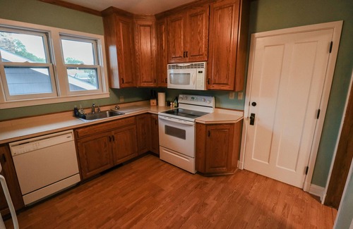 Grand Forks House | Riverside Duplex: 2 Bedrooms with Pool & Breakfast Included
