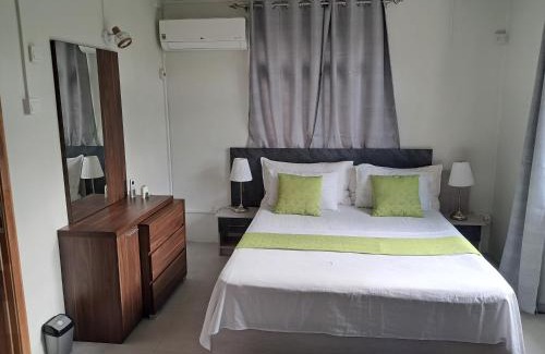 Grand River South East House | Oceanfront Riverside Holiday Home with Top Guest Ratings