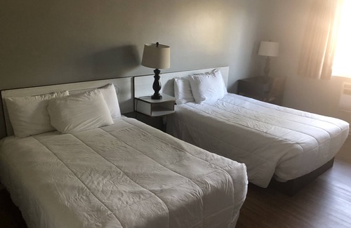 Dallas Hotel | Eco-Friendly Riverside Inn in Dallas with Breakfast Included