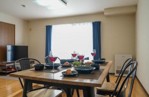 Shinhidaka Apartment | Cozy Riverside Mansion - Family-Friendly Vacation Retreat