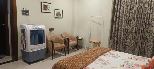 Sualkuchi House | Pet-Friendly Riverside Palm Room Near Kamakhya & IHR