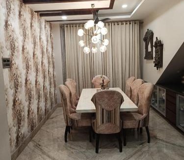 Sualkuchi House | Pet-Friendly Riverside Palm Room Near Kamakhya & IHR