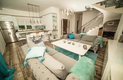 Mali Radic Villa | Relax at Riverside Plaza: Oceanfront Bliss & Family Fun