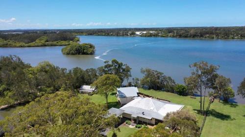 Micalo Island House | Riverside Ranch: Family-Friendly Retreat with Pool Access