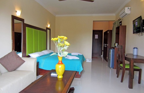 Baga Hotel | Riverside Regency Resort: Family-Friendly Getaway with Pool