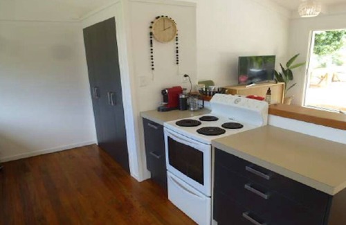 Whangamata House | Beachfront Family Retreat with Private Jetty & Spa Pool