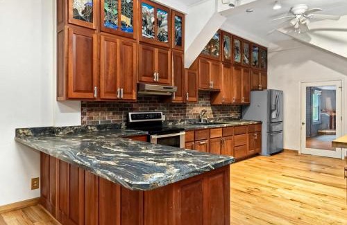 McDowell House | Riverside Retreat: Your Karaoke and Poolside Getaway