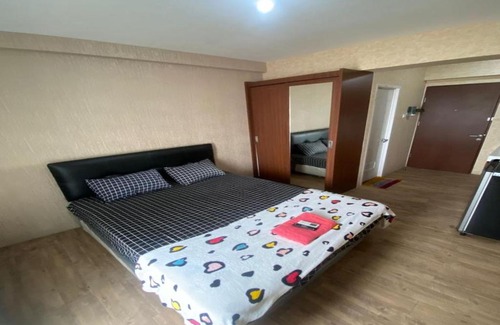 Cikarang Apartment | Tranquil Riverview Apartment with Pool & Family Amenities