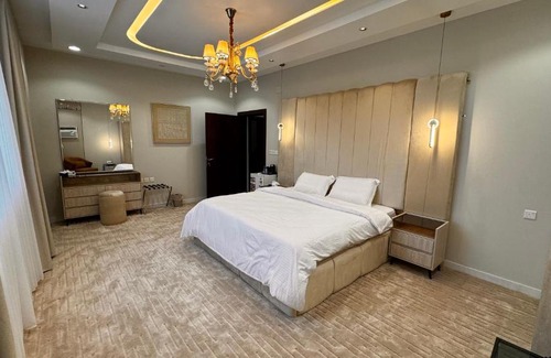 Jizan Apartment | Rkeen Residence 1- lounge and bedroom