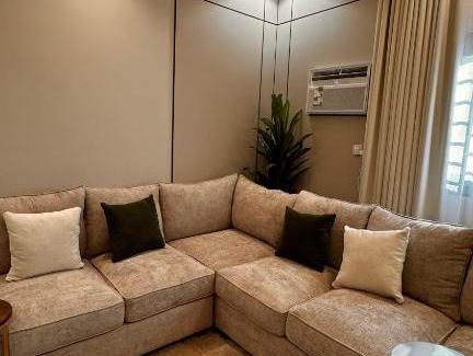 Jizan Apartment | Rkeen Residence 1- lounge and bedroom