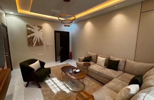 Jizan Apartment | Rkeen Residence 1- lounge and bedroom
