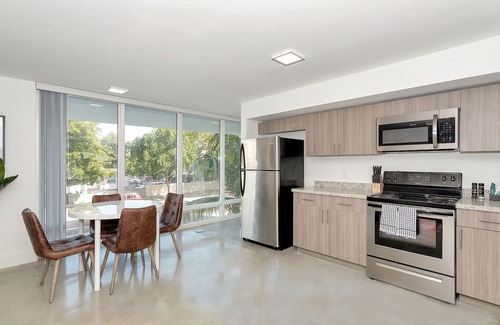 Coral Way Apartment | Discover Roami at Grove 27: Oceanfront & Pet-Friendly Retreat