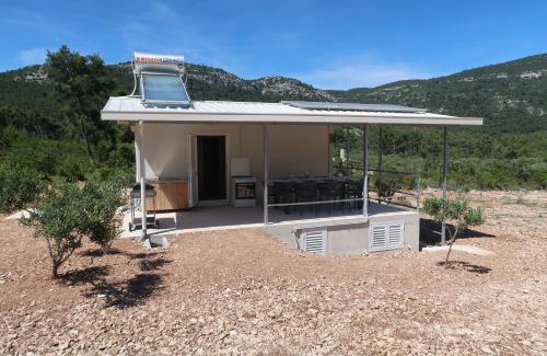 Cara House | Relax at Robinson Olive Tree Huts - Pet and Child Friendly