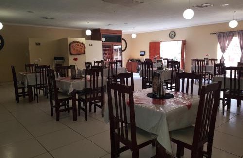 Oshakati Hotel | Relax at Rocha's Hotel: Pool, Breakfast & Family Friendly