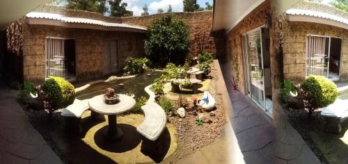 Emalahleni House | Comfortable Rock Art Guesthouse with Family Amenities
