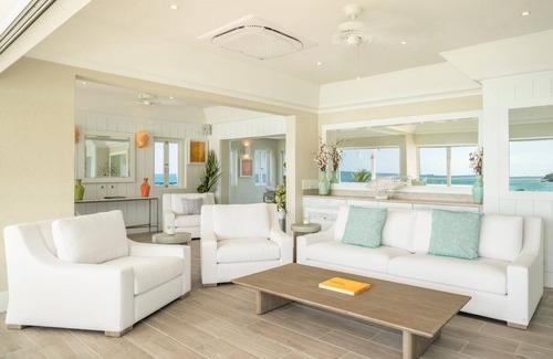 Dickenson Bay Resort | Rock Cottage: Spacious Five-Bedroom Retreat with Pool