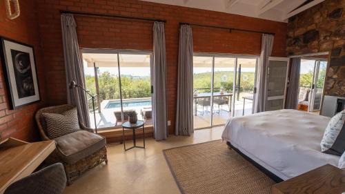Madikwe Game Reserve Cabin | Experience Rockfig Lodge Madikwe: Oceanfront Retreat with Pool