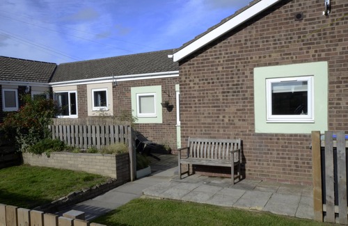 Beadnell House | Pet-Friendly Rockpool Cottage with Enclosed Garden Escape