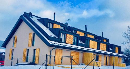 Dolni Morava Apartment | Inviting Apartmán 2+kk with Restaurant & Family-Friendly Vibes