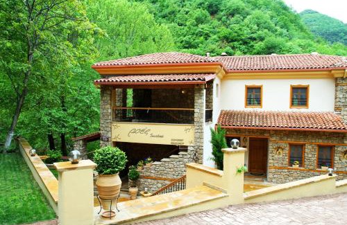 Almopia Apartment | Elegant Roes Suites: 4-Star Stay with Hot Tub & Breakfast