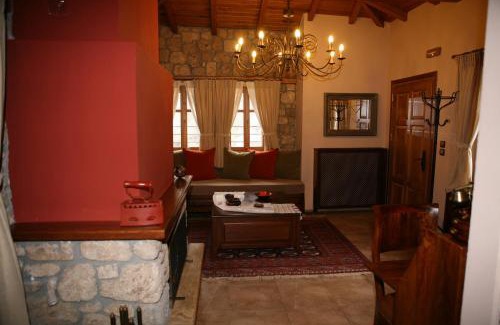 Almopia Apartment | Elegant Roes Suites: 4-Star Stay with Hot Tub & Breakfast