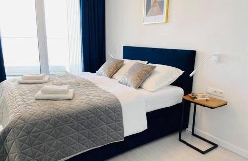 Trzebiatow Apartment | Premier Oceanfront Rogowo Pearl Apartment with Pool