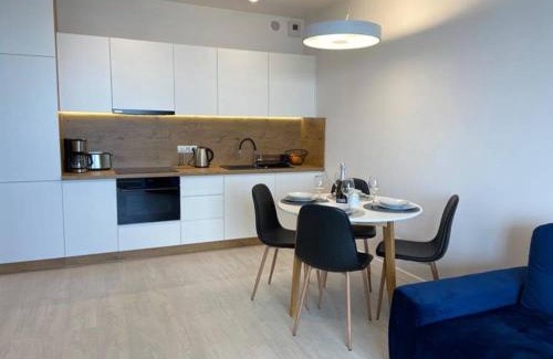 Trzebiatow Apartment | Premier Oceanfront Rogowo Pearl Apartment with Pool