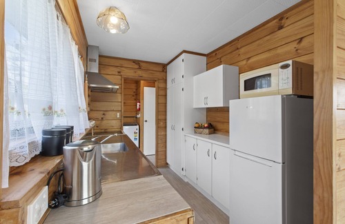 Otaua House | Relaxing Rolling Hills Retreat: Family-Friendly Holiday Home