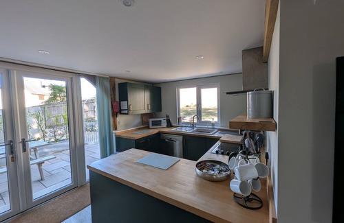 Holworth Cottage | Pet-Friendly Roman Lodge with Garden in Beautiful Osmington
