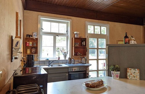 Baekern House | Romantic Retreat with Pool, Garden & Fireplace by the Lake