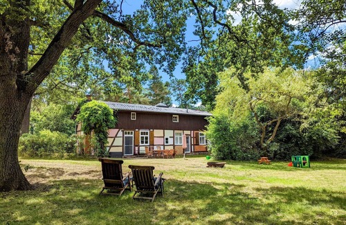 Baekern House | Romantic Retreat with Pool, Garden & Fireplace by the Lake