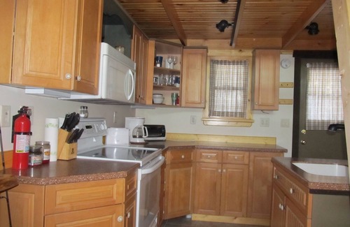 Naples Cabin | Discover Trickey Pond: Oceanfront Retreat with Spa & Breakfast