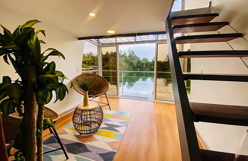 Guatape Boat Rental | Tranquil Houseboat Retreat with Ocean and Lake Views