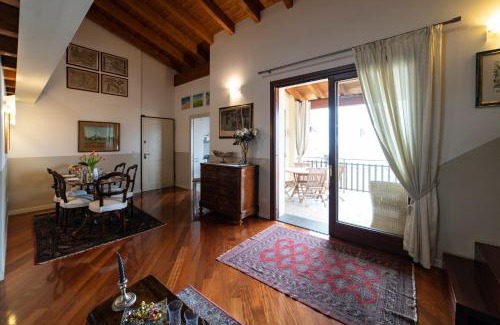 Sulzano Apartment | Serene Lake View Retreat with Pool and Hot Tub Amenities