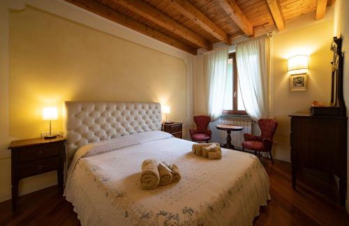 Sulzano Apartment | Serene Lake View Retreat with Pool and Hot Tub Amenities