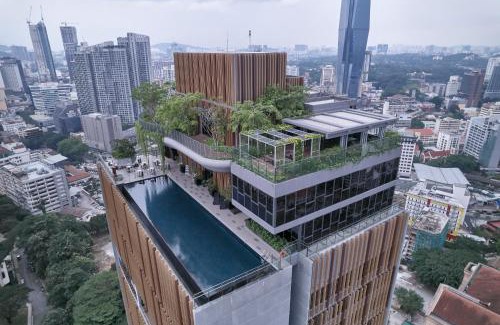 Bukit Bintang Apartment | Romantic Log Cabin in KL - Walk to Attractions & Pool