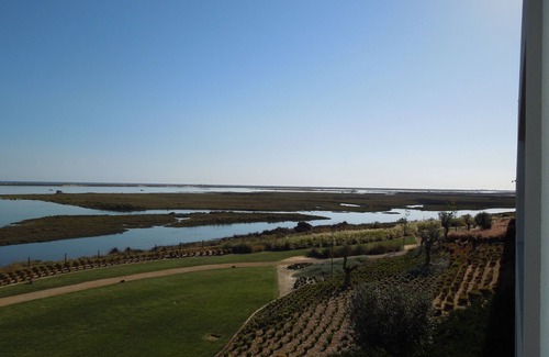 Olhao Apartment | Minimalist Retreat: 10-Minute Beach Access & Pool
