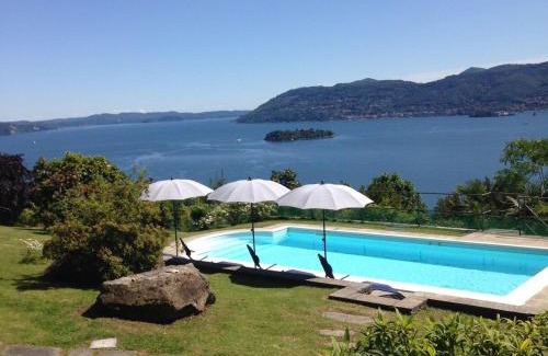 Suna Villa | Romantic Nido: Pet-Friendly Retreat with Pool Access